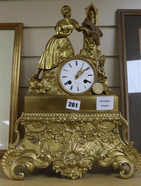 A 19th century French gilt brass clock